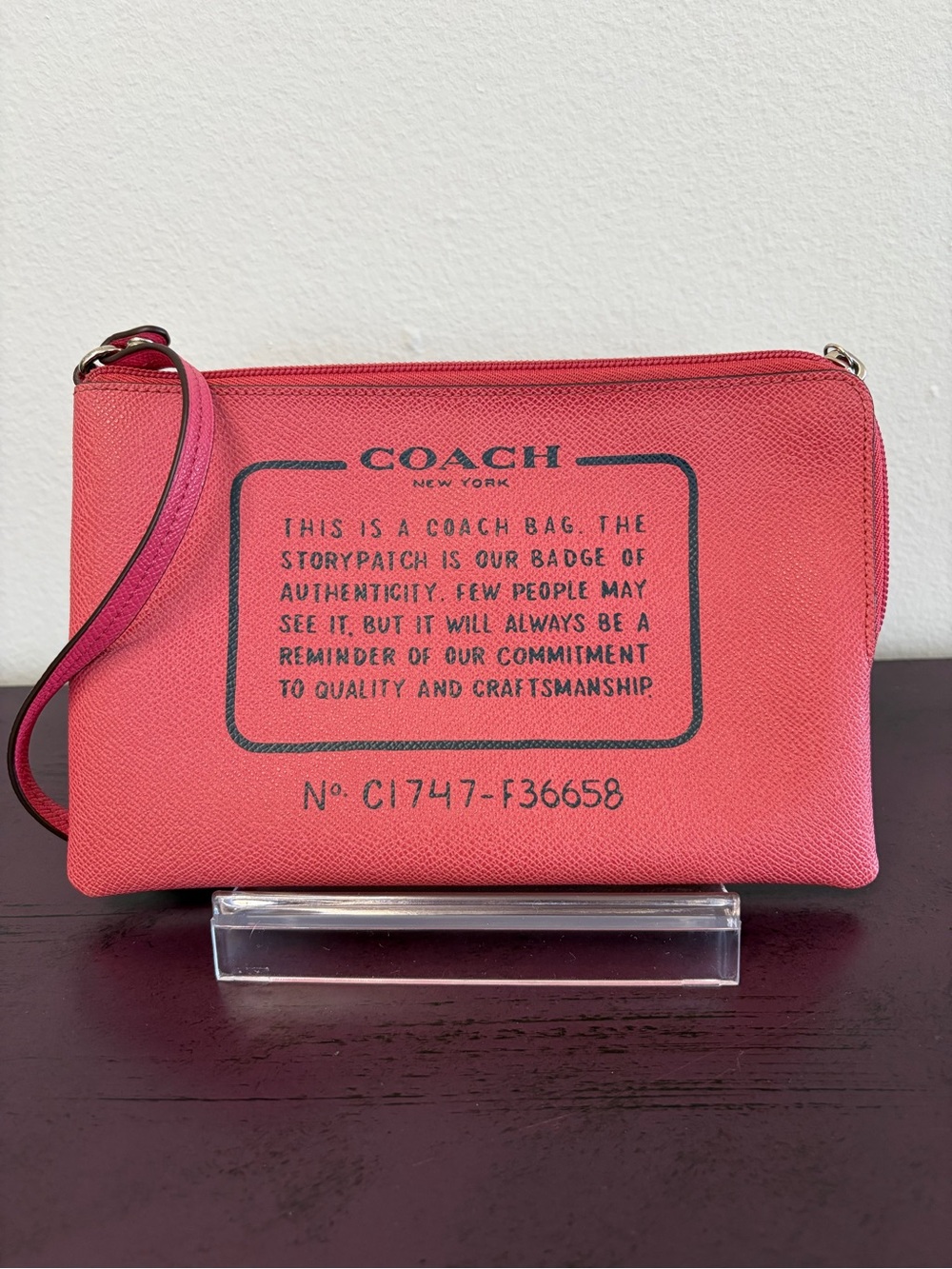 COACH Coral Pink Storypatch Wristlet with Logo Stamp